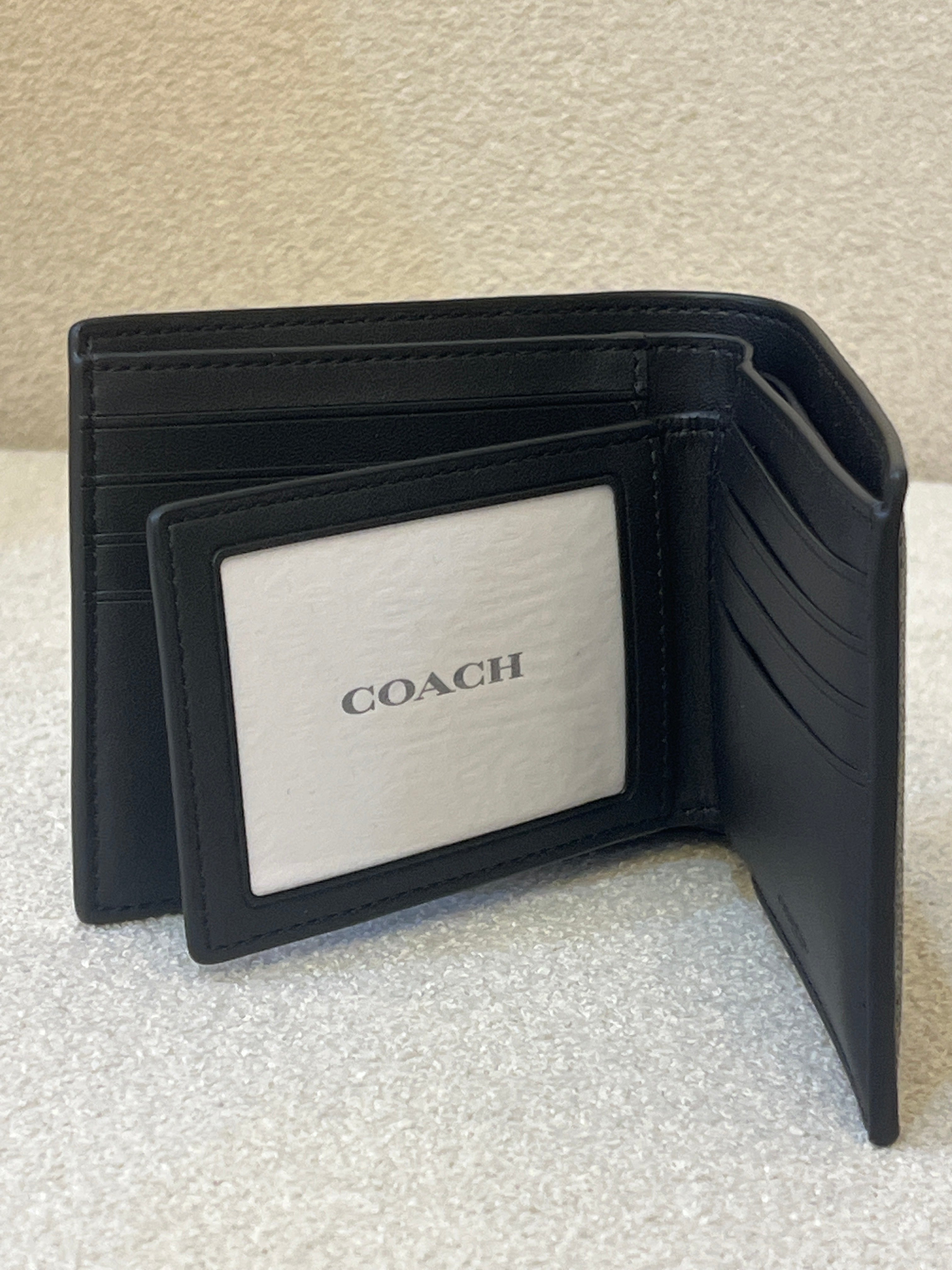 Coach 3-In-1 Wallet in Signature Canvas, featuring a removable insert with an ID window and credit card slots