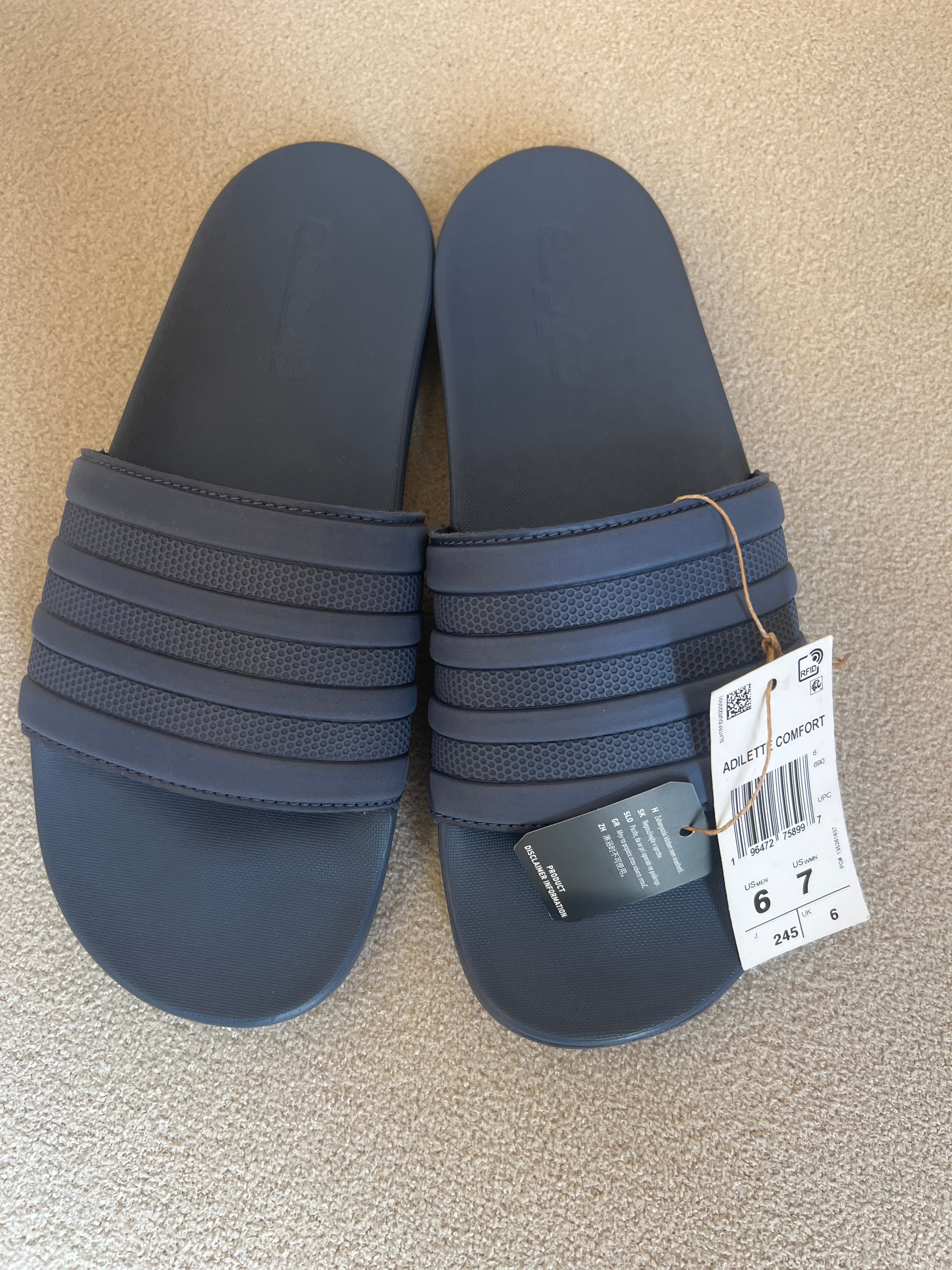 Adidas Adilette Comfort Slides in a blue colorway