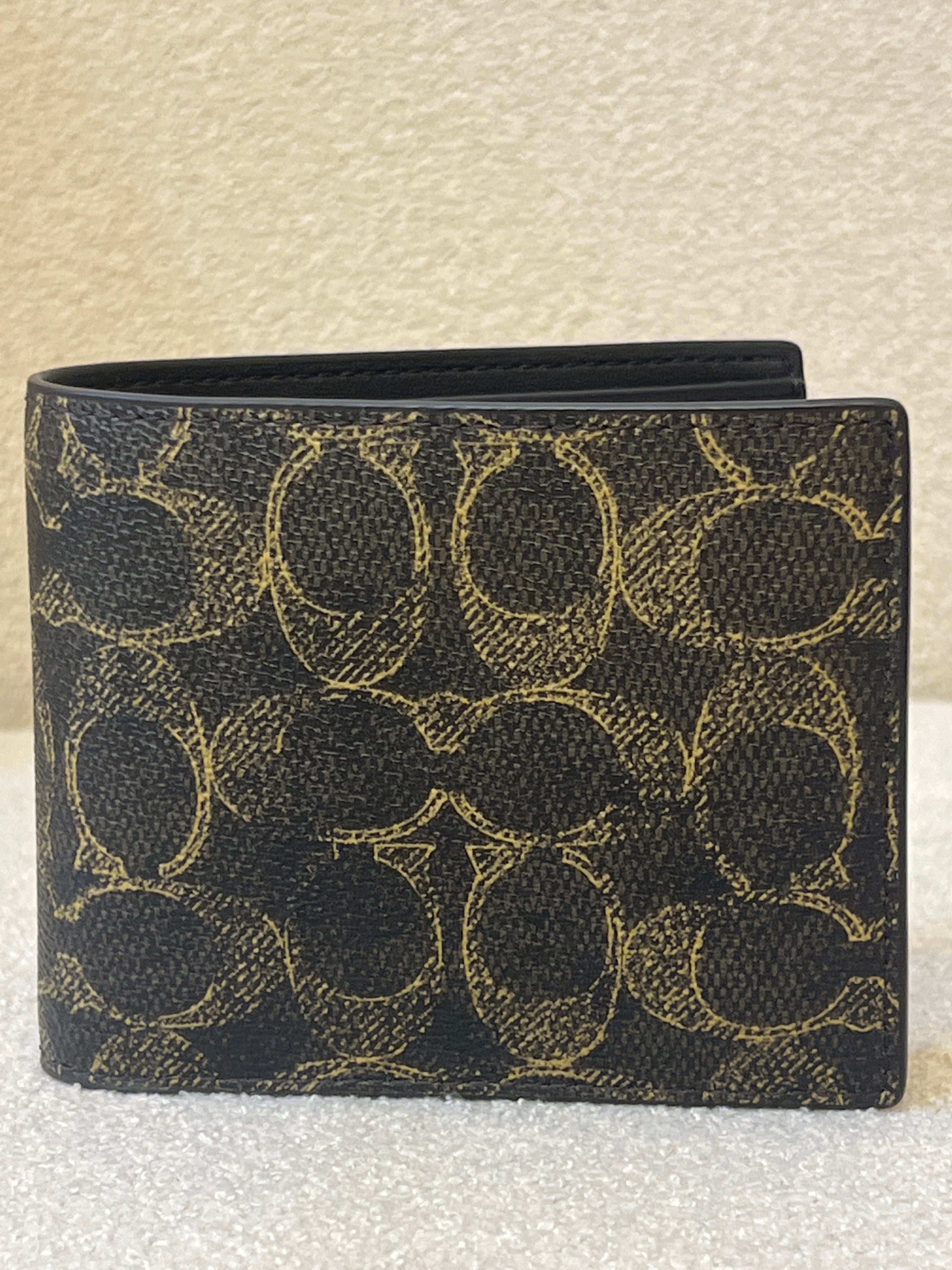 Coach 3-In-1 Wallet in Signature Canvas, featuring a removable insert with an ID window and credit card slots