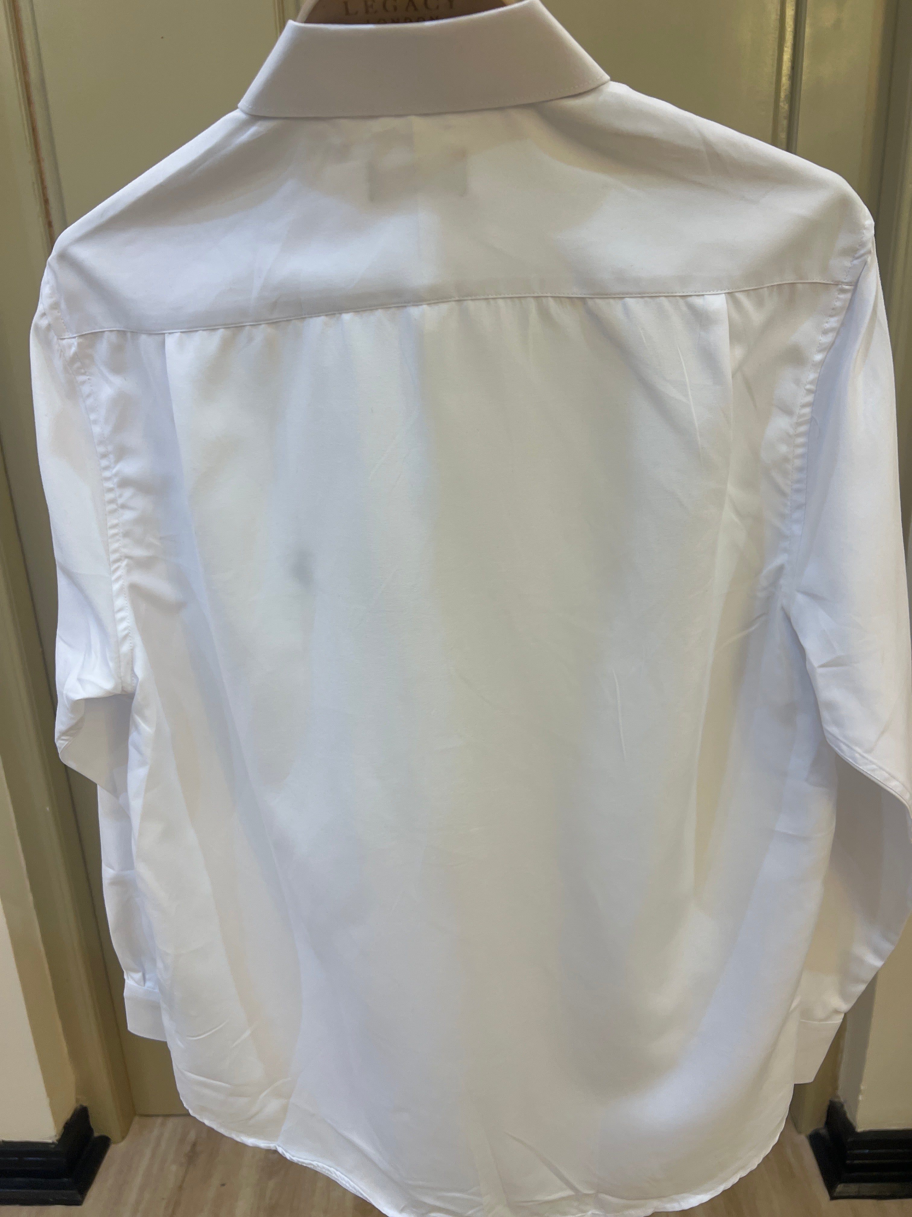 U.S. Polo Assn. long-sleeve button-up shirt features a classic embroidered polo player logo on the chest