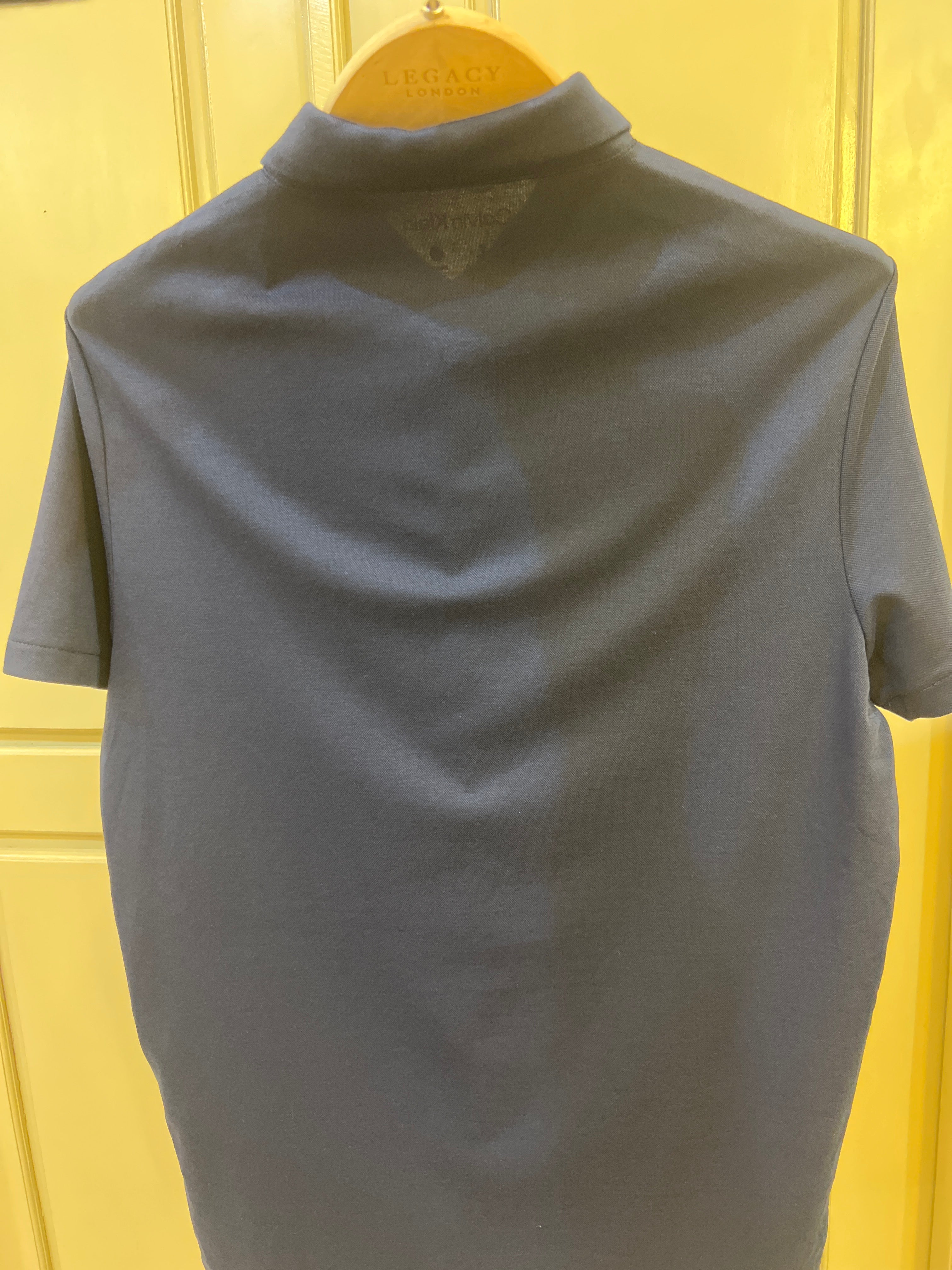 Calvin Klein Men's Slim Fit Shirt in a solid navy blue color, featuring a button-down collar