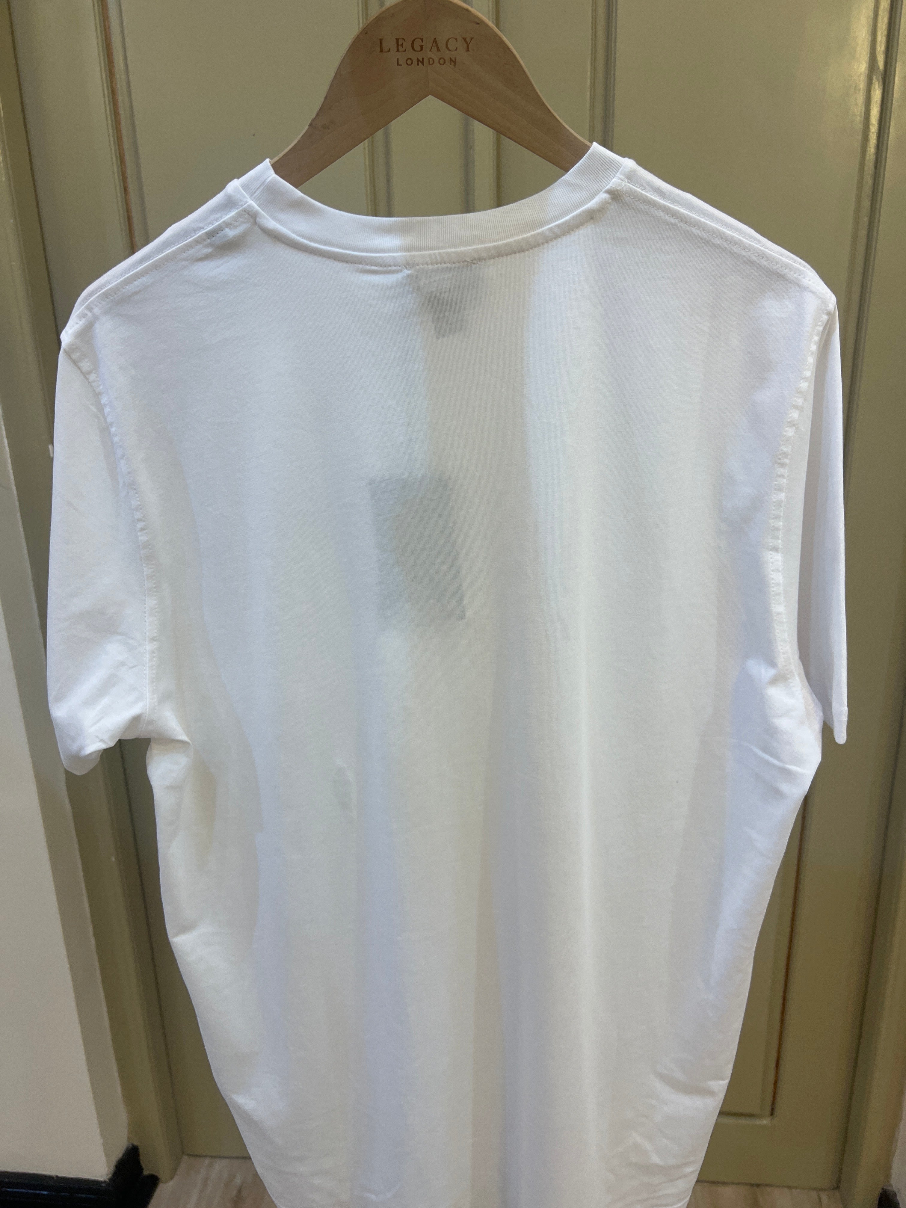 Diesel T-shirt features a small, red, white, and black jacquard logo patch on the chest