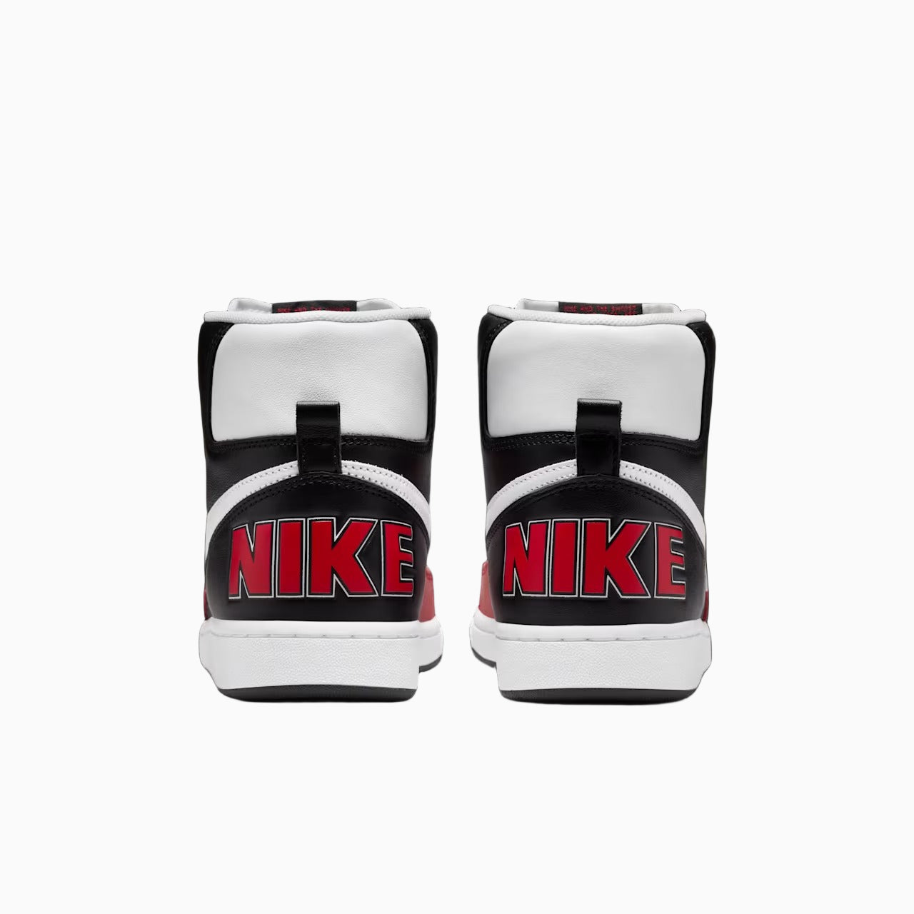 Pair of Nike boxing gloves on a black background