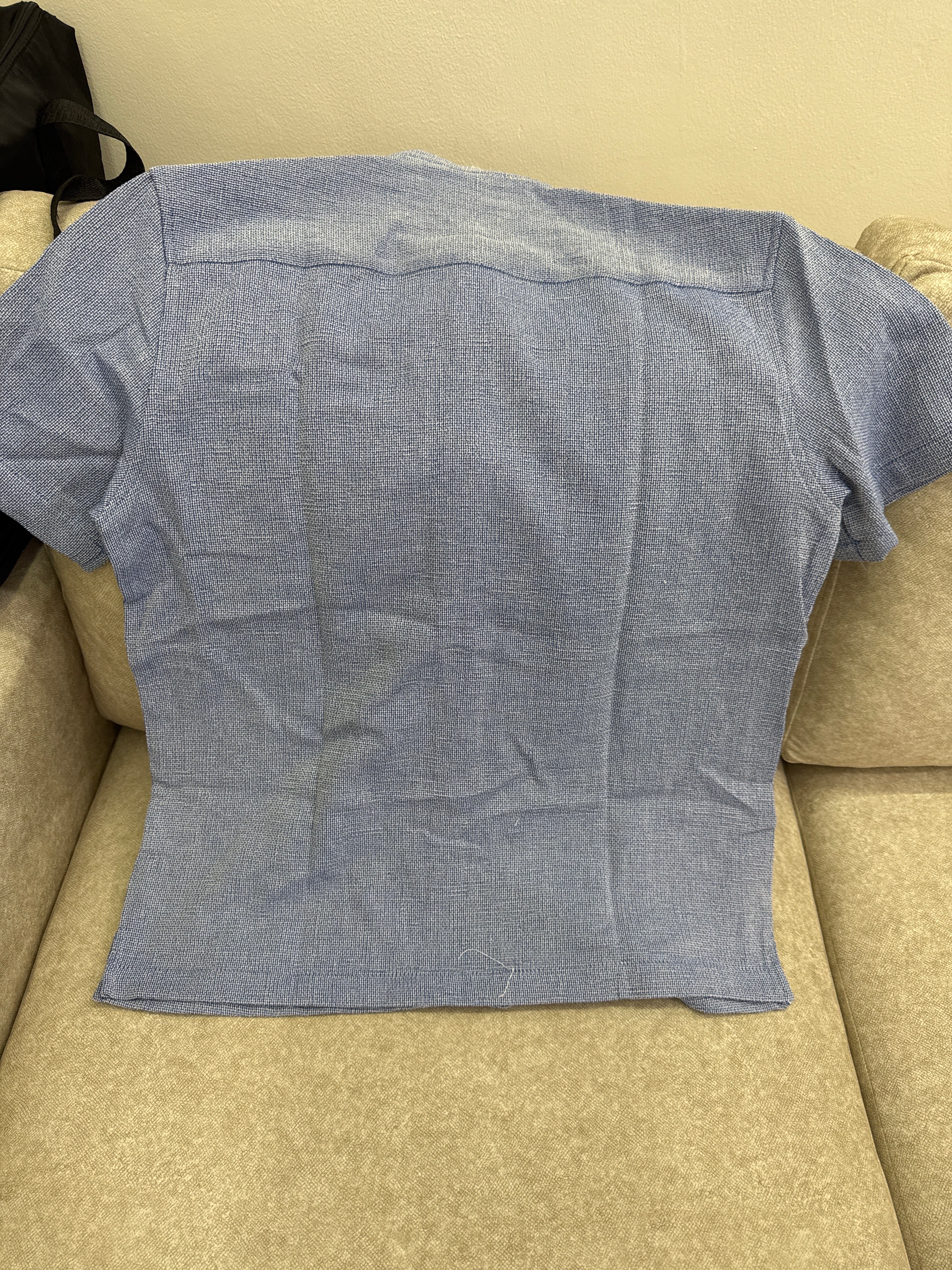 This blue textured long-sleeve shirt is a Zara brand