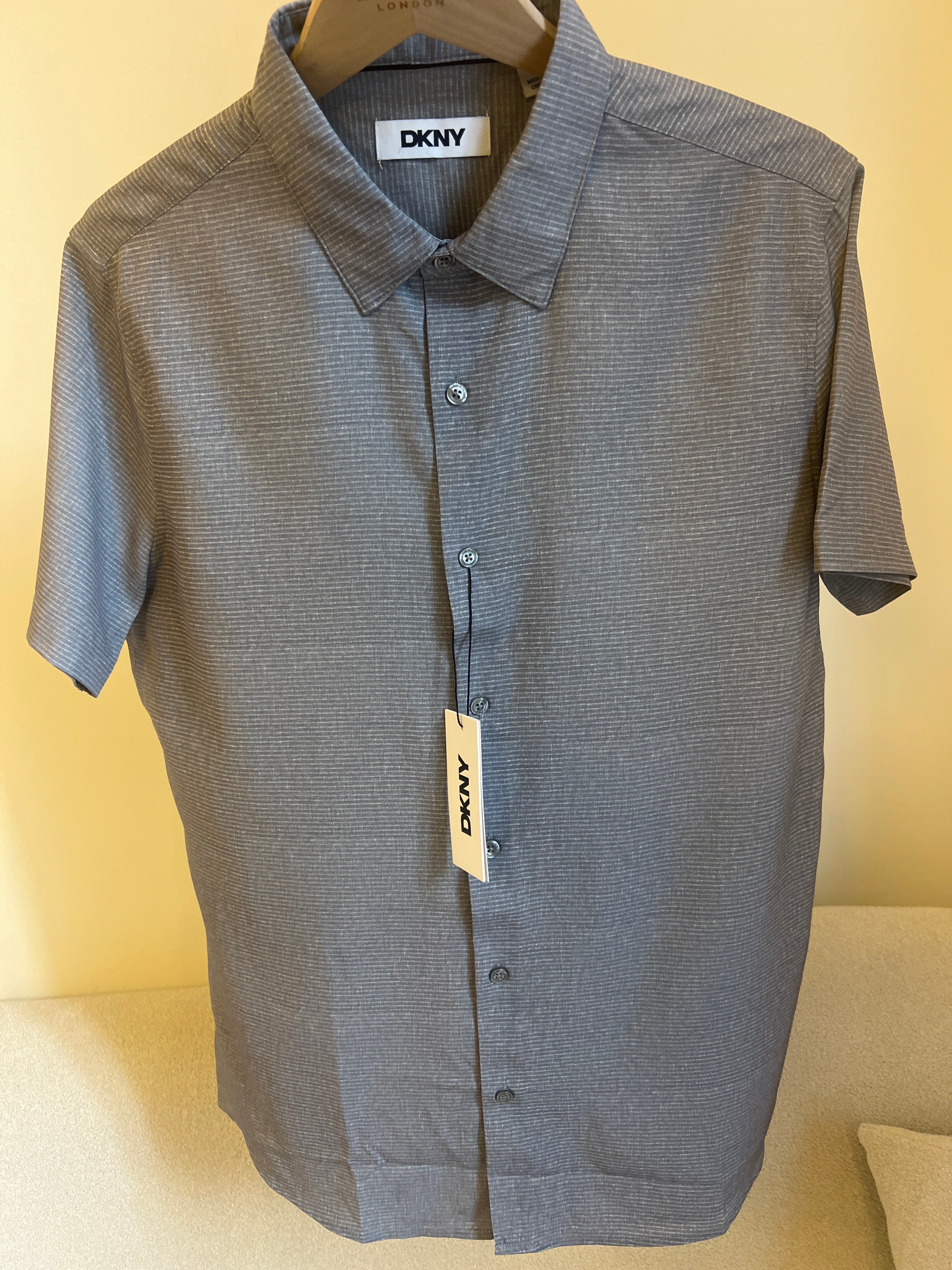 DKNY short-sleeve button-down shirt features a subtle horizontal texture