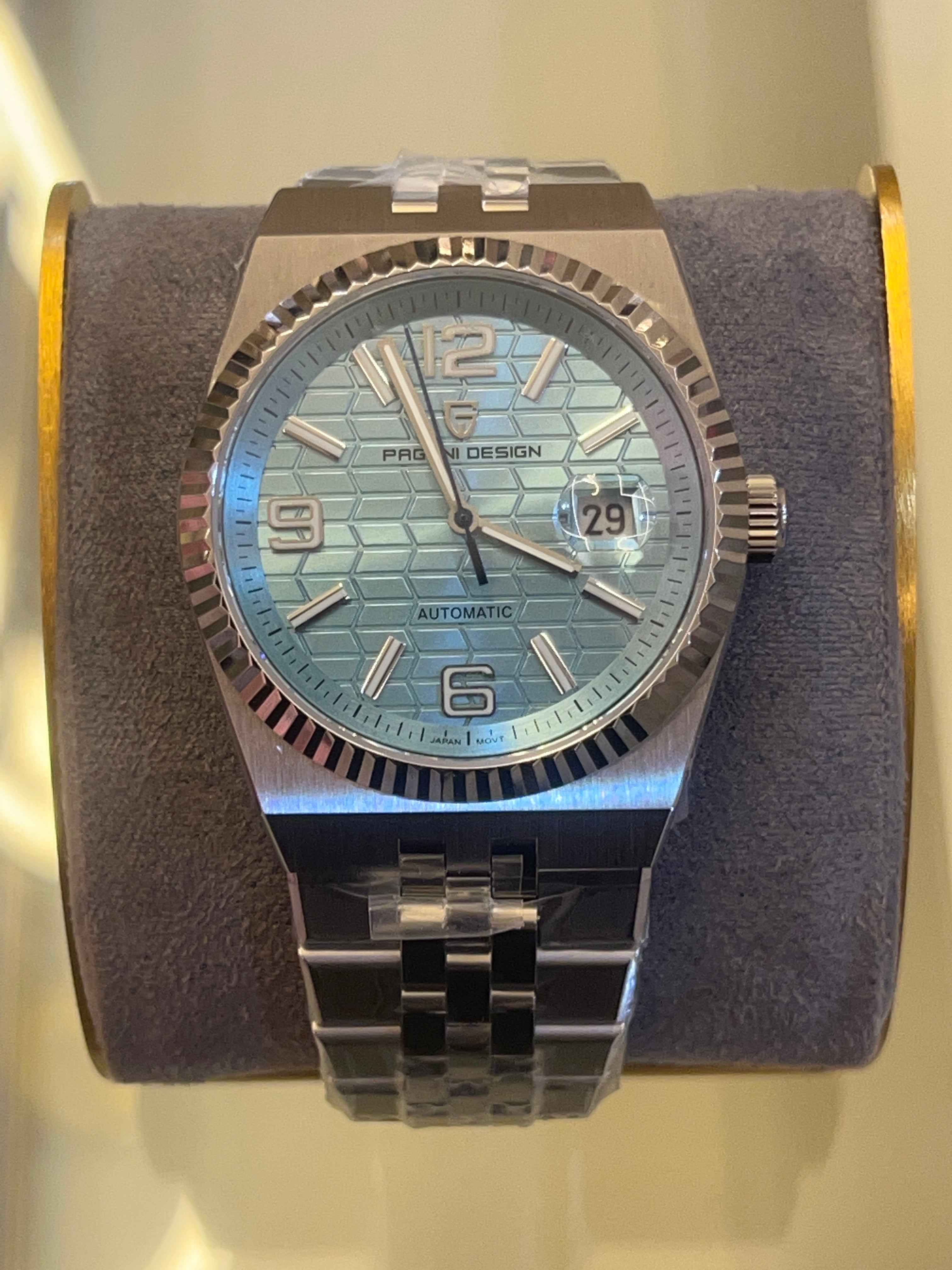 Pagani Design PD-YS027 automatic mechanical watch with an ice blue/sky blue honeycomb dial and a stainless steel integrated bracelet