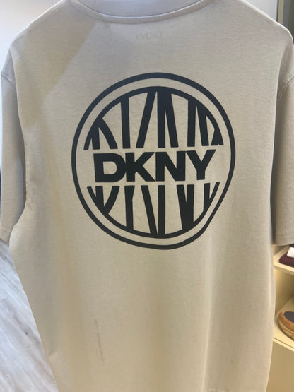 DKNY t-shirt, likely featuring a crew neck and short sleeves, is branded with a prominent "DKNY CIRCA 1989" logo on the chest and back print
