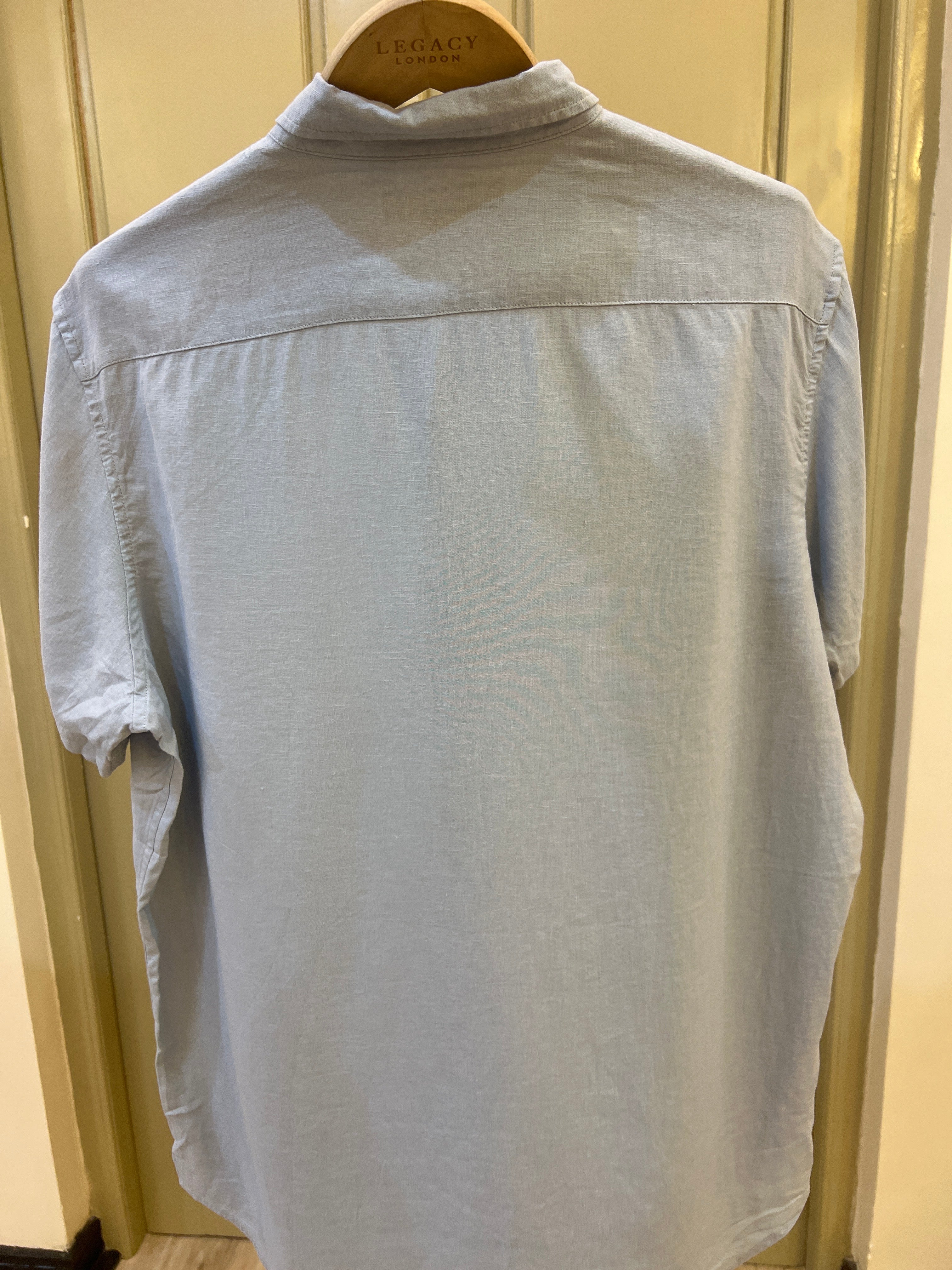 Michael Kors short-sleeve shirt features a button-down collar and a classic fit