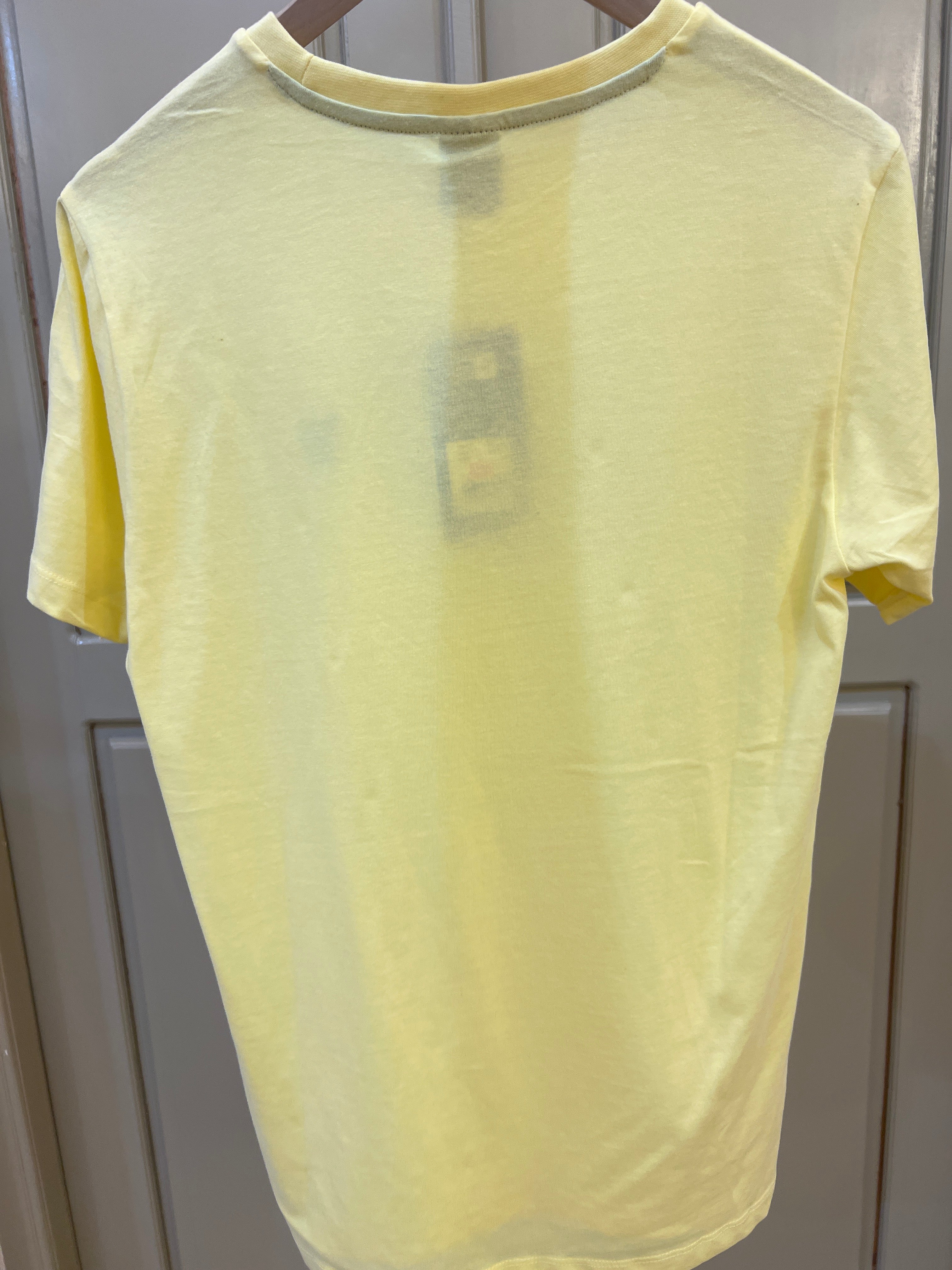 S. Polo Assn. yellow crew neck t-shirt features a blue embroidered pony logo