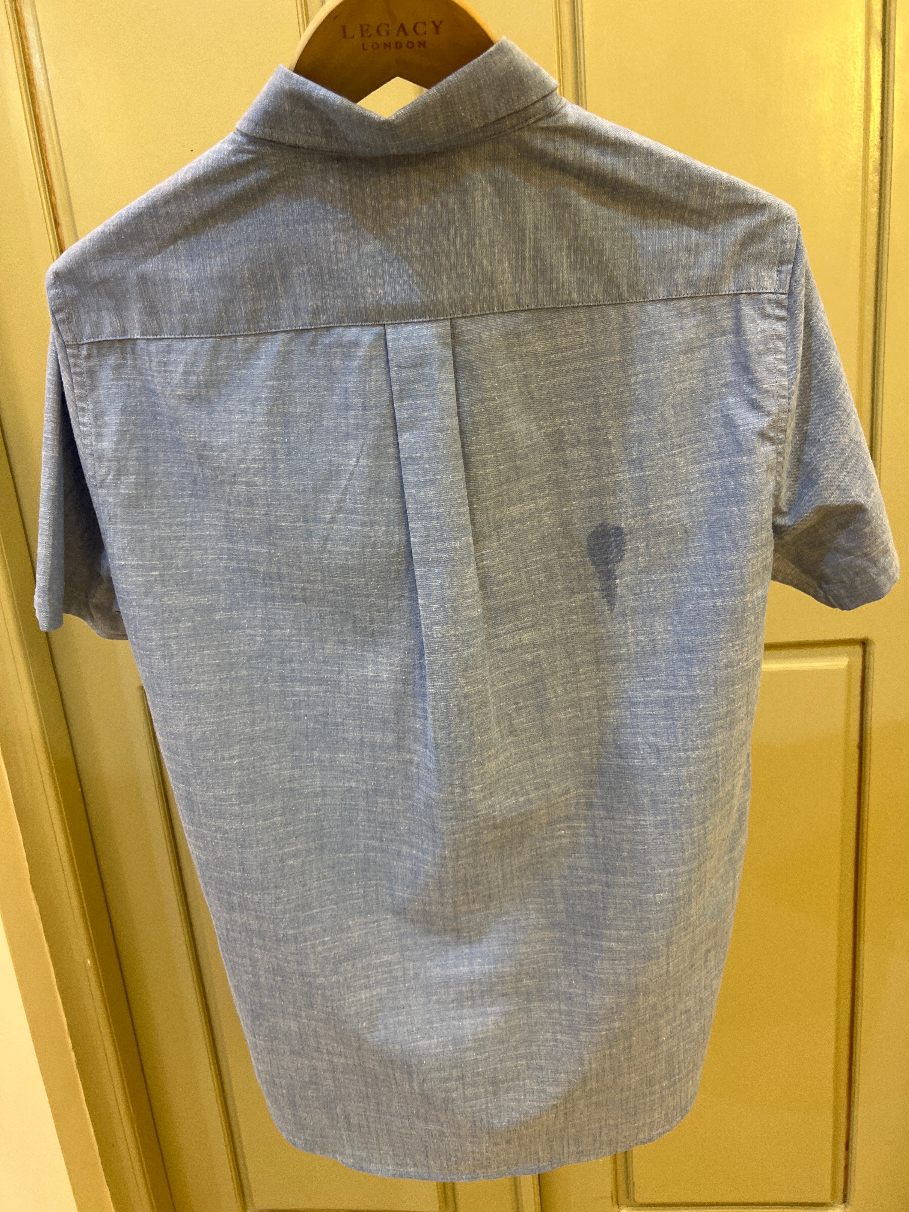 S. Polo Assn. short-sleeve oxford shirt featuring a button-down collar and a small embroidered logo on the chest pocket