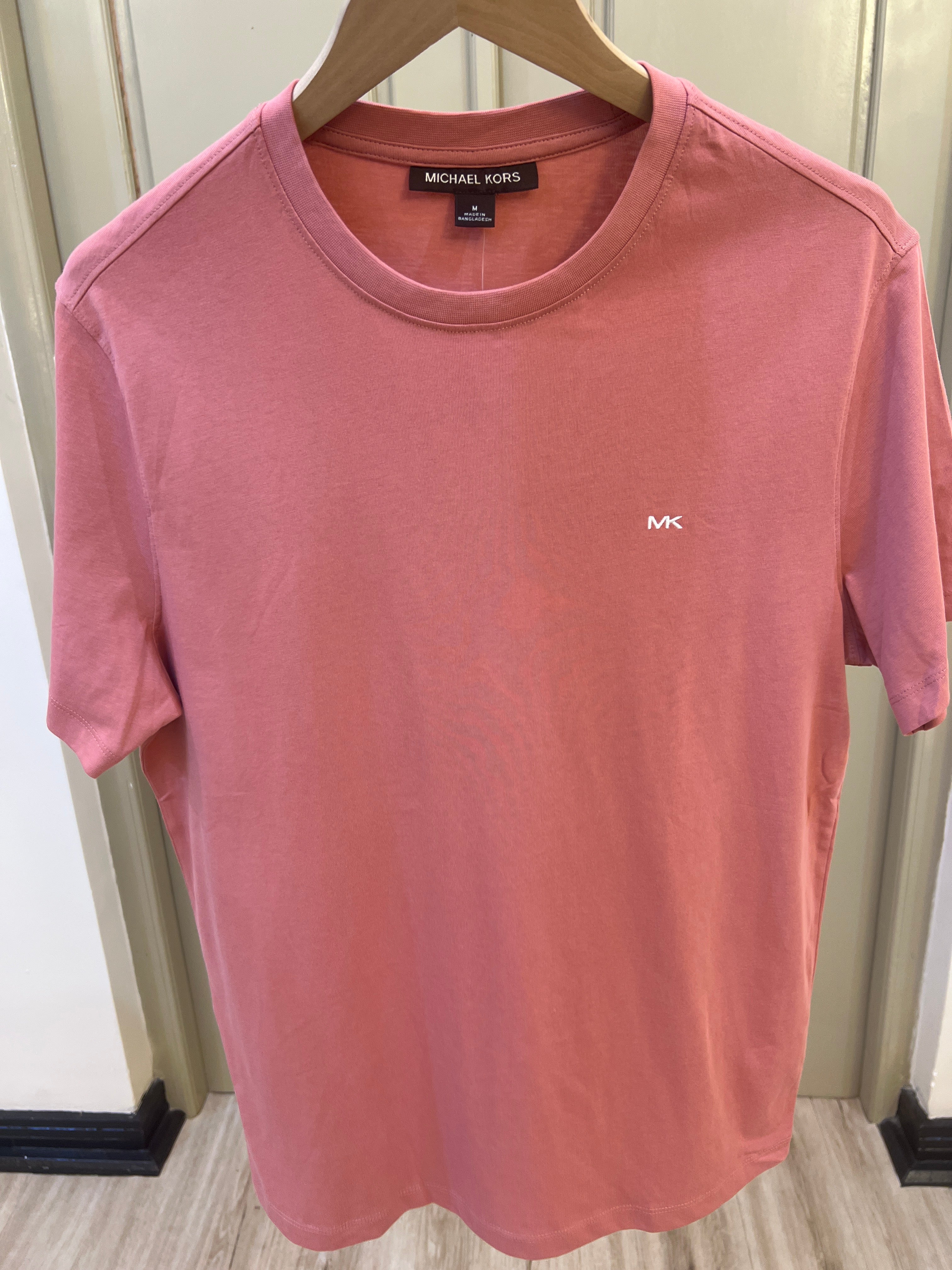 Michael Kors men's crew-neck T-shirt features a small white embroidered logo on the chest