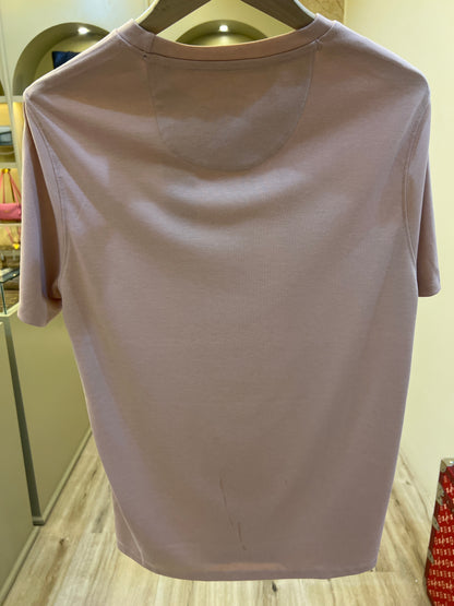 DKNY logo t-shirt features a subtle embroidered monogram on the chest and a crew neckline