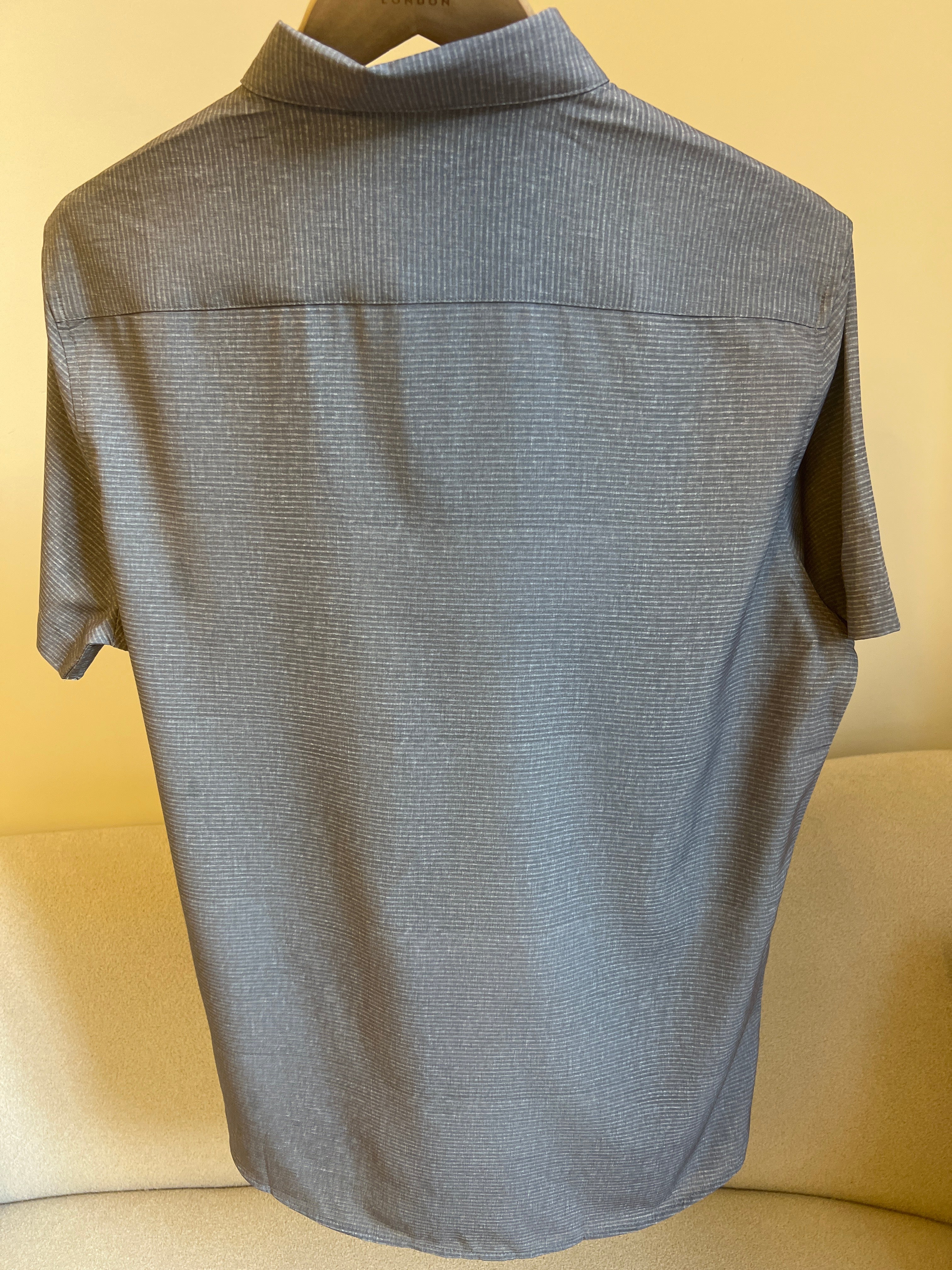 DKNY short-sleeve button-down shirt features a subtle horizontal texture