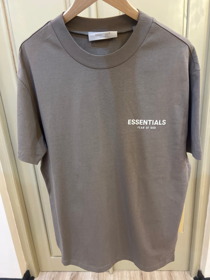 Fear of God Essentials Desert Taupe T-shirt featuring a prominent white logo on the chest