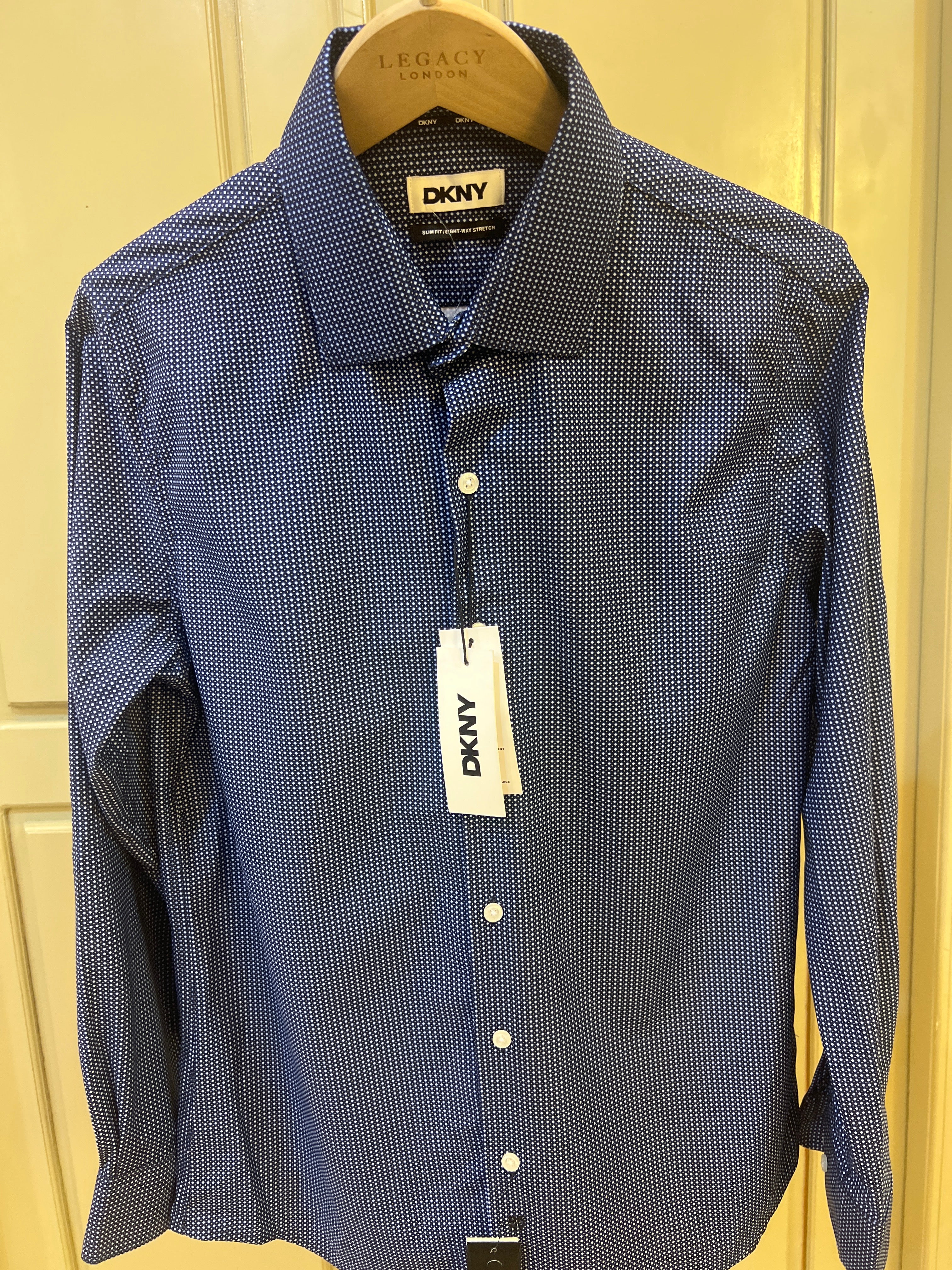 DKNY long-sleeve dress shirt featuring a small white polka dot pattern