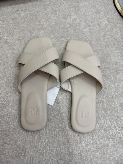 beige crossover strap sandals are the Gap Criss-Cross Sandals