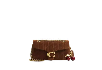 Coach Quilted Tabby 26 shoulder bag in suede with a gold-tone logo hardware and a chain strap