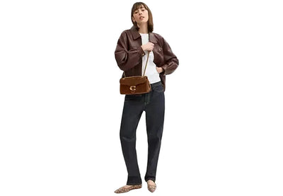 Coach Quilted Tabby 26 shoulder bag in suede with a gold-tone logo hardware and a chain strap