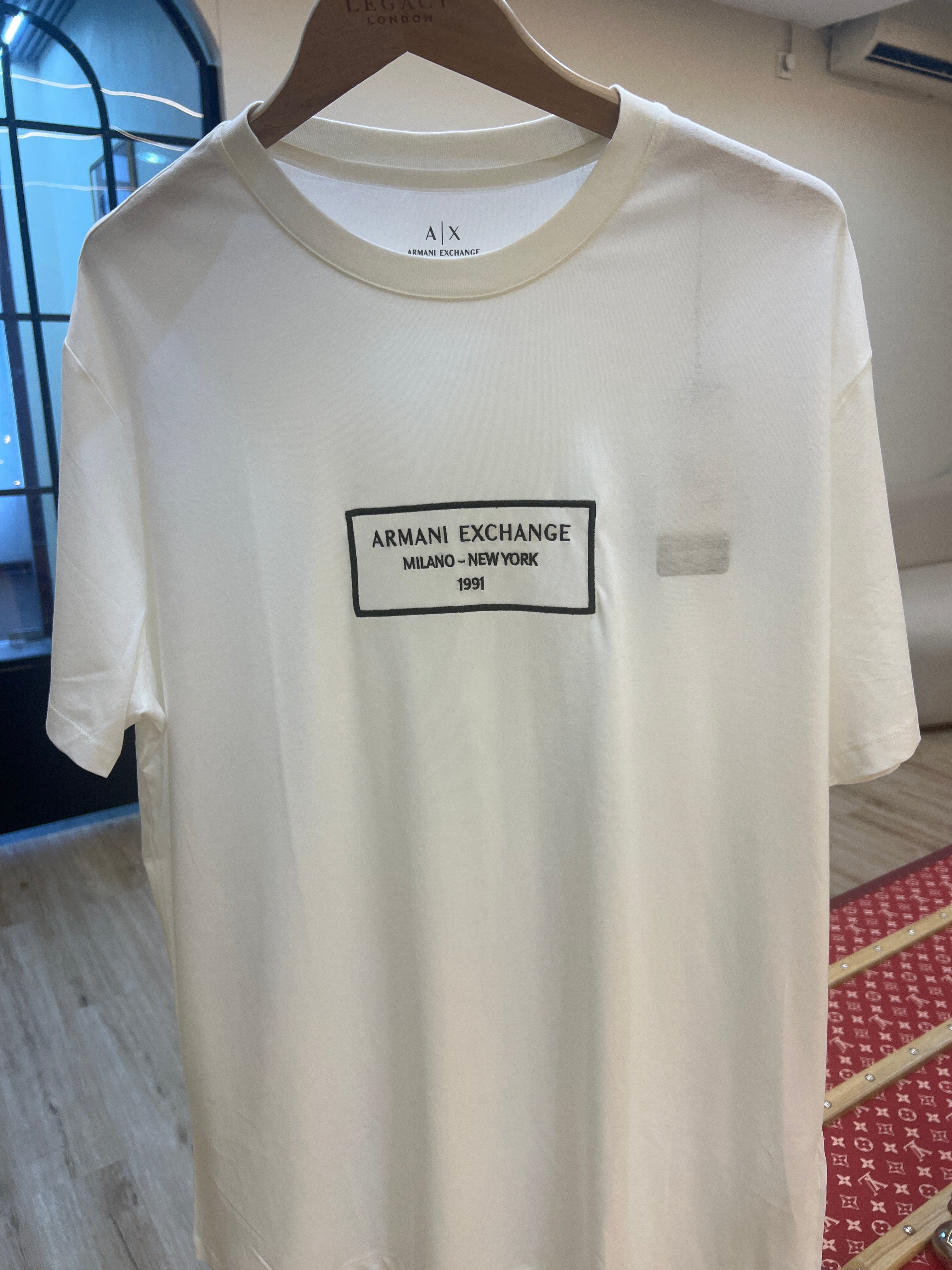 Armani Exchange Milano-New York logo t-shirt, likely model XM000552 AF10356, made of cotton with a crew neck and short sleeves