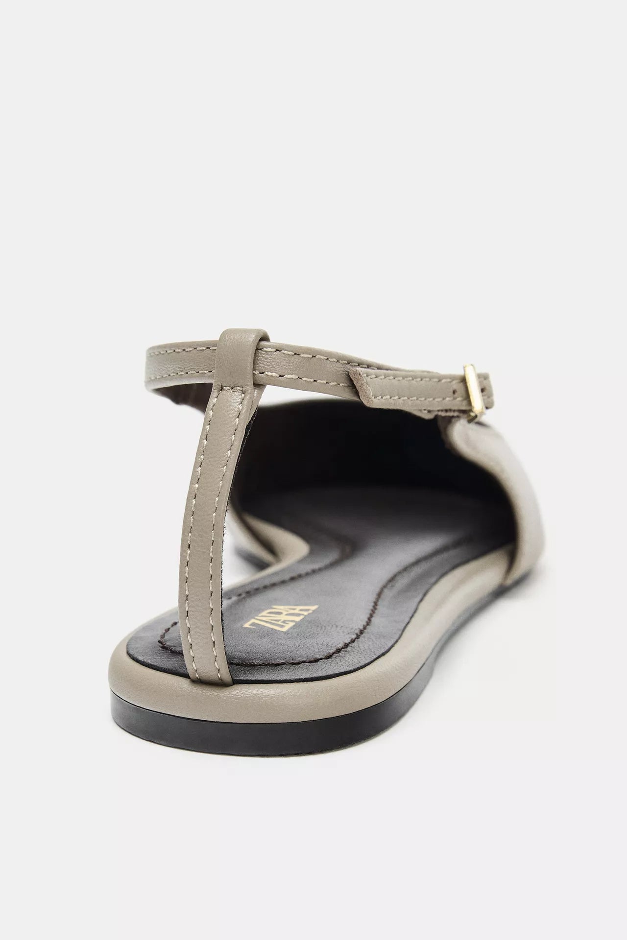 taupe leather slingback shoes are from Zara