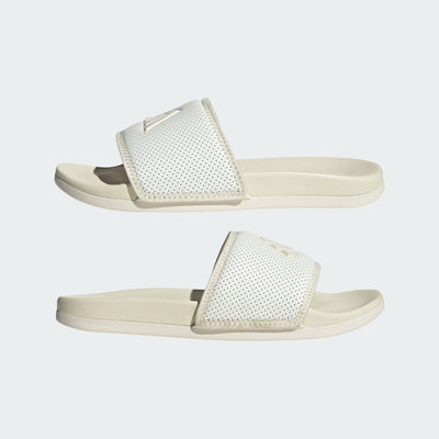 Adidas Adilette Comfort Slides in the white or off-white colorway