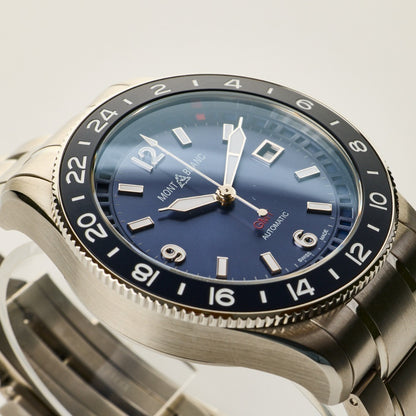 Montblanc 1858 GMT 42mm automatic watch with a blue dial and a stainless steel bracelet